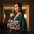 6e026546-2f19-472a-8594-b20ed77fba50 Midnight Bloom Handcrafted Floral Beaded Clutch