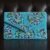 e95f57dc-29de-4dfe-ba86-97315c4cca2c Blue Sunray Luxe Beaded Clutch