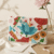 pomelli_photoshoot_image_9_16_0422 (3) Floral Beaded Envelope Clutch with Chain Strap
