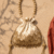 Golden Pearl Handle Potli Bag