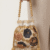 Floral Pearl Embroidered Potli Bag