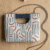 pomelli_photoshoot_image_9_16_0430 Vintage Baseball Beaded Mini Clutch Bag