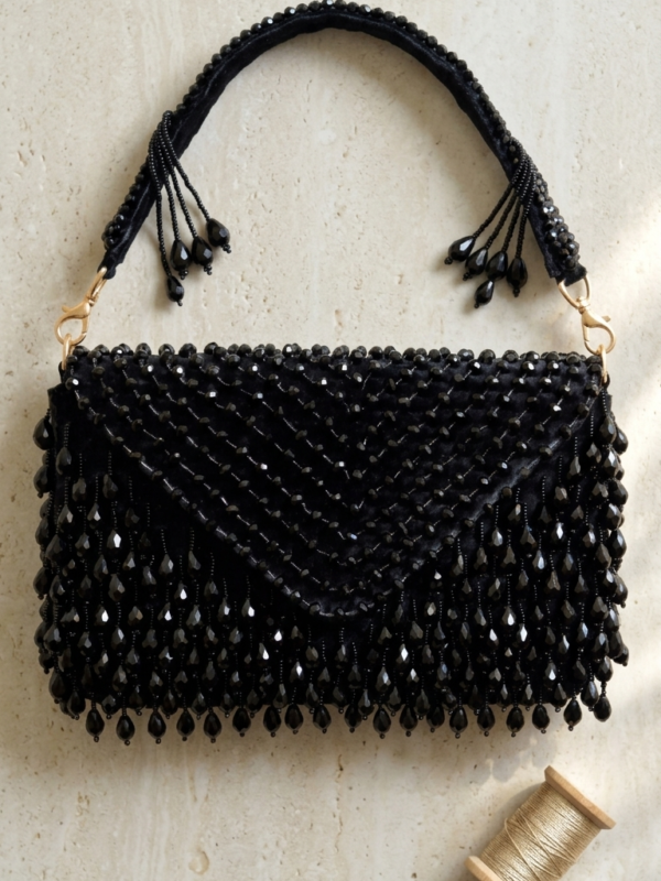 pomelli_photoshoot_image_9_16_0623 (31) Midnight Fringe Glam Clutch