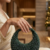 pomelli_photoshoot_image_9_16_0623 (5) Emerald Luxe Crescent Clutch