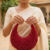 pomelli_photoshoot_image_9_16_0623 (52) Ruby Radiance Crescent Clutch