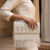 pomelli_photoshoot_image_9_16_0624 (11) Pearl Cascade Fringe Clutch