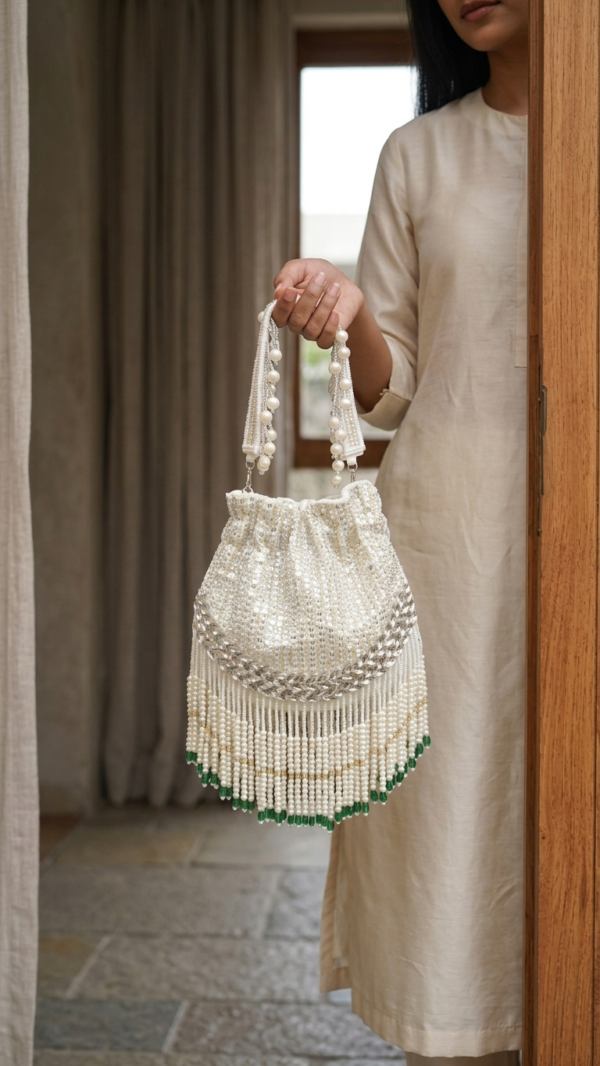 pomelli_photoshoot_image_9_16_0624 (2) Pearl Cascade Potli Bag