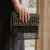 pomelli_photoshoot_image_9_16_0624 (23) Midnight Glam Fringe Clutch