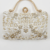 pomelli_photoshoot_image_9_16_0624 (36) Pearl Crown Luxe Clutch
