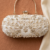 pomelli_photoshoot_image_9_16_0624 (4) Pearl Royale Embellished Clutch