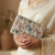 pomelli_photoshoot_image_9_16_0624 (40) Carnival Bloom Beaded Clutch