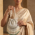 pomelli_photoshoot_image_9_16_0624 Pearl Cascade Potli Bag
