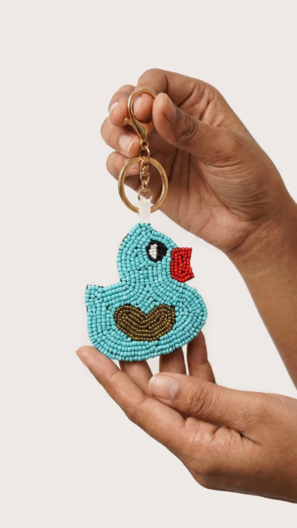 pomelli_photoshoot_image_9_16_0630 (13) Aqua Duck Beaded Keychain