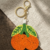 pomelli_photoshoot_image_9_16_0630 (31) Beaded Double Orange Keychain Charm