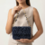 pomelli_photoshoot_image_9_16_0704 (11) Midnight Sparkle Beaded Handbag