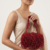 pomelli_photoshoot_image_9_16_0704 (28) Ruby Fringe Glam Handbag
