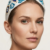 pomelli_photoshoot_image_9_16_0715(2) Azure Pearl Bloom Bow Hairband