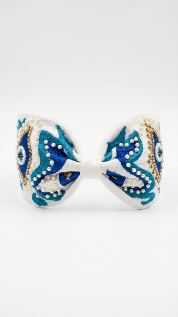 pomelli_photoshoot_image_9_16_0715(5) Azure Pearl Bloom Bow Hairband