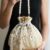 Ivory Pearl Blossom Embellished Potli